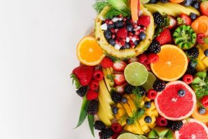 A picture of a plate of fruit as part of a daily routine for a healthy body.